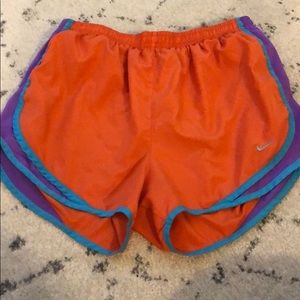 Orange, purple and blue nike shorts